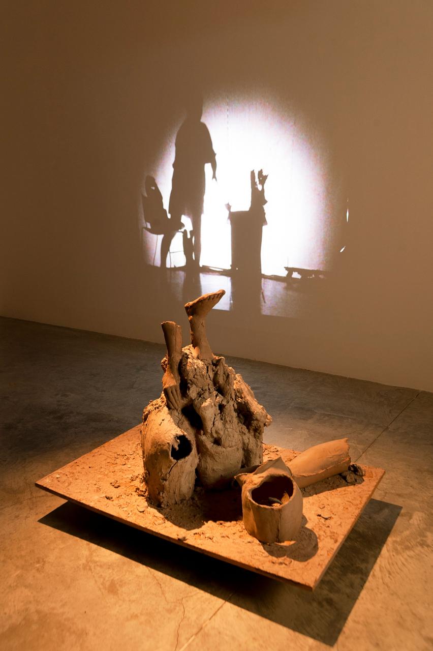 Tomo Ingalls. Being With, 2021. Raw clay. How to Become, 2022. Video Projection. Photo Credit Leia Guo. 