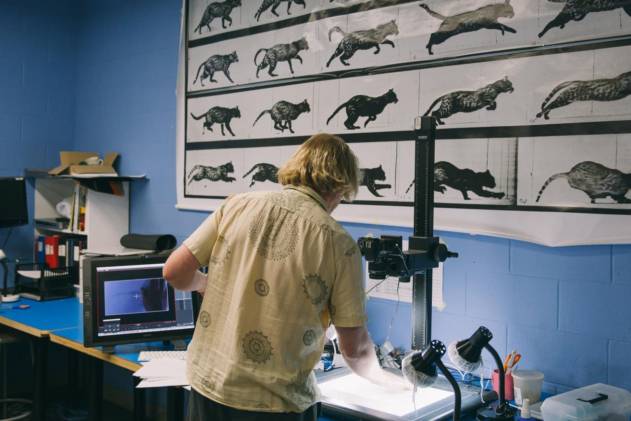 Animation instructor works at stop motion setup in AUArts animation studio.
