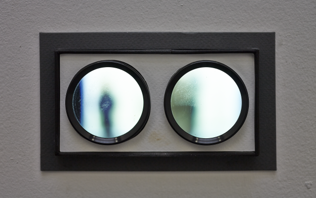 Detail of the peephole lenses. This shot shows the detail of the frame and lenses.