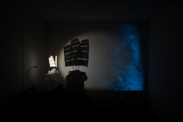 Pavitra Wickaramsingha. Silence of Thought, Music of Sight , 2012. Video Installation, HD-­‐Video/Animation projection, laser-­‐cut paper, crystal, glass, metal, plastic and electronics by Darsha Hewitt