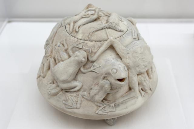 Detail of the frog slip cast vessel. 
