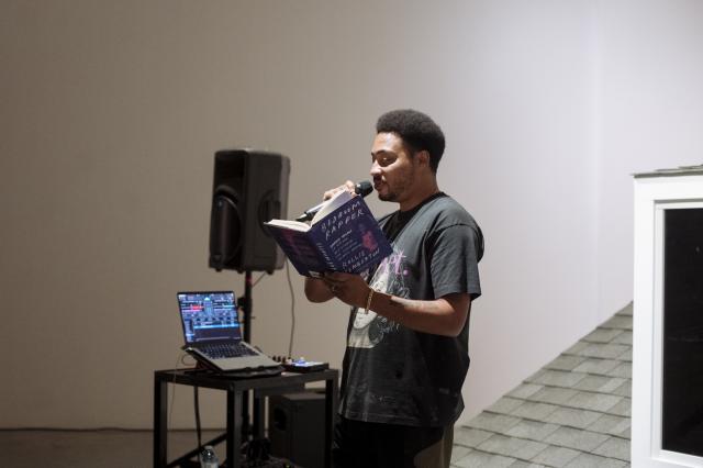 Rollie Pemberton reading from his book, "Bedroom Rapper". Photo credit Elyse Bouvier.